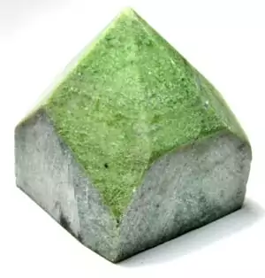 A green garnet top-polished crystal point with natural rough base and polished apex showing deep green garnet coloration, for heart chakra and regenerative energy work.
