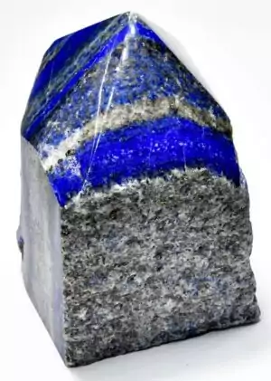 Large approximately 6.6 pound lapis lazuli crystal point with top-polished deep royal blue surface and golden pyrite flecks, a premium meditation and altar specimen.