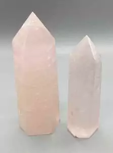 1 lb rose quartz crystal points in 2-5 inch size showing natural pink stone towers of varied height — heart chakra love stone bulk lot.