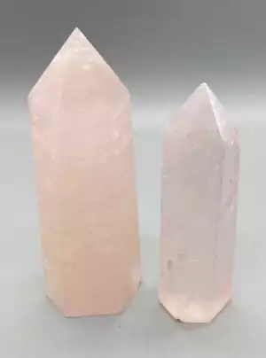1 lb rose quartz crystal points in 2-5 inch size showing natural pink stone towers of varied height — heart chakra love stone bulk lot.