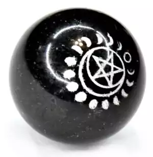 50mm polished tourmaline crystal sphere engraved with a pentagram and crescent moon — protective sacred geometry altar sphere.
