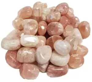 One-pound collection of smooth deep red calcite tumbled stones for root chakra activation physical grounding vitality and emotional calming energy practice