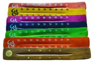 10-inch flat wooden Om ash catcher with colorful incense sticks displayed in the holder — stick incense tray with Om symbol engraving for meditation and yoga practice.