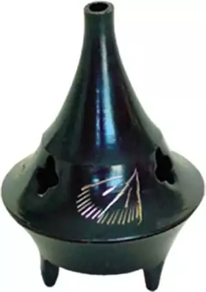 Traditional black ceramic conical burner on a round base with decorative markings — 2.25-inch brass cone incense burner with star cutout ventilation design.