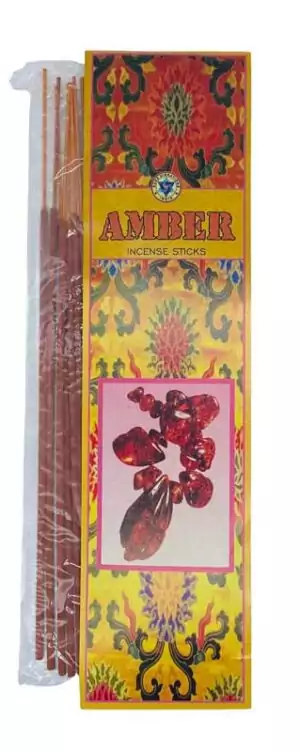 Package of Pure Vibrations amber incense sticks with colorful floral and amber-stone label, 20 sticks hand-rolled in India for solar ritual use.