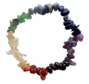 7 chakra chip bracelet — circular arrangement of polished multi-colored gemstone chips showing full spectrum from red to violet, representing seven chakras.