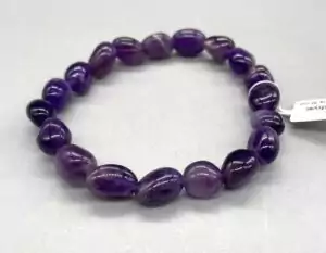 Amethyst gemstone bracelet of oval-shaped purple stone beads varying from deep violet to lighter lavender, arranged in a circular elastic bracelet