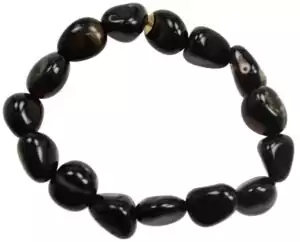 Black tourmaline gemstone bracelet of smooth polished dark stones in varied natural shapes, displayed as a circular elastic bracelet