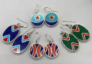 Assorted inlay stone earrings displaying geometric patterns and multi-color gemstone inlay designs in various artisan drop earring styles.