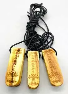 Set of three 2-inch palo santo wooden pendants with Namaste symbol engraving on natural wood grain — sacred wood necklace set.