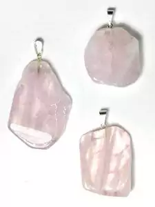 A natural rose quartz crystal slice pendant showing a thin translucent soft-pink slab with drilled top for necklace wear, natural edge and polished face.