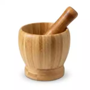 4-inch wooden mortar and pestle set showing smooth natural wood finish on both bowl and grinding tool, photographed on a clean surface.