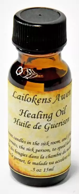 A 15ml Lailokens Awen Healing ritual anointing oil bottle with printed label, for spiritual healing ceremonies, candle dressing, and wellness ritual work.