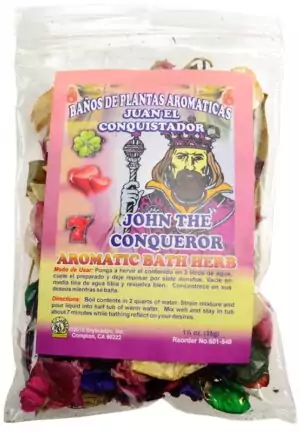 A packet of John the Conqueror aromatic bath herbs (Juan Conquistador) showing a dried herb mixture used in hoodoo ritual baths for personal power and obstacle removal.