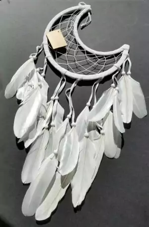 Half Moon white dream catcher 8.5 inches — crescent moon-shaped woven dream catcher with white feathers and beaded string for dream protection and lunar-themed wall display.