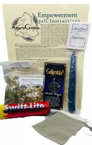 Empowerment Ritual Kit — complete candle ritual box with charcoal, empowerment candle, spell mixes, mojo bags, Power Triangle amulet, and instruction sheet for personal power rituals.