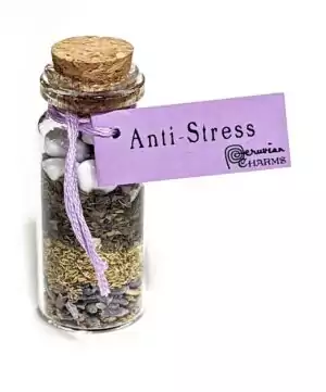 Small corked glass anti-stress pocket spellbottle with calming Moon herbs and crystals for anxiety relief and peace ritual charm