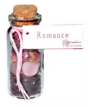 Small corked glass romance pocket spellbottle with herbs and crystals for romantic love ritual and attraction magic charm