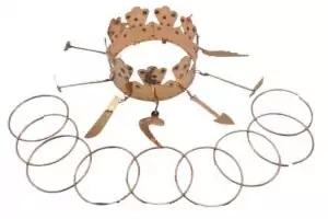 Oya orisha tools ritual set in multicolored array — traditional Santería implements for the Orisha of winds, storms, and transformation in Lucumí practice.