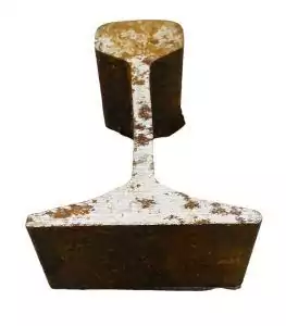 Railroad track iron piece used in road-opening spells and path-clearing ritual, showing aged iron metal.
