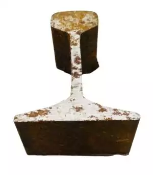 Railroad track iron piece for hoodoo rootwork — used in road-opening spells and fixed track magical practice, showing aged iron metal.