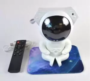 7-inch astronaut projection lamp casting colorful galaxy pattern on ceiling and walls, cosmic night light for meditation and aesthetic decor