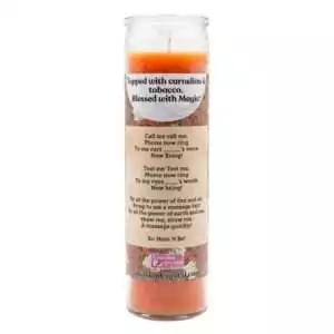 Tall orange ritual candle with prayer label indicating carnelian and tobacco contents — intent-focused candle for drawing communication and positive energy.