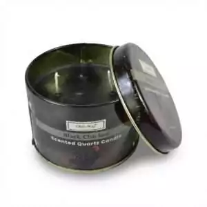 Black round Ohli-Way Gallina Negra ritual tin candle with lid partially open — Black Hen quartz crystal candle for hex removal and deep spiritual uncrossing work.
