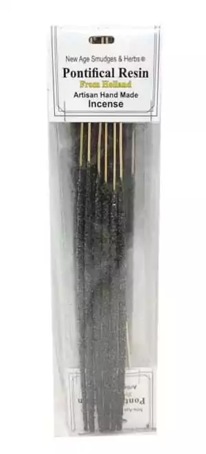 Artisan handmade Pontifical Resin incense sticks labeled and packaged in a clear box showing dark sticks arranged neatly for ceremonial ritual burning