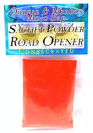 Red sachet powder in a small labeled packet reading Road Opener from Oungan and Manbos Mojo Bag line, marked as consecrated formula.