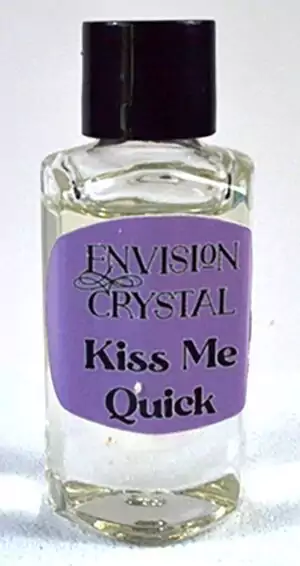 Small 2-dram bottle of Envision Crystal Kiss Me Quick fast love-drawing ritual anointing oil for attraction spells and romance rituals.