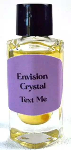Small glass bottle of Text Me ritual oil 2 dram by Envision Crystals with yellow liquid and playful communication-spell label