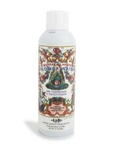 Decorative aerosol can of Murray & Lanman Florida Water labeled as air freshener and deodorizer — ornamental floral design on the bottle.