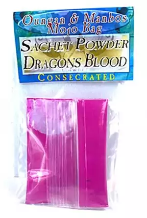 Bright pink Dragon's Blood sachet powder in a clear plastic bag with colorful header label indicating consecrated ritual powder for protection and spell work