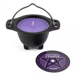 Small black cast iron cauldron holding a purple lavender-scented candle, with a circular pentagram label on the front.