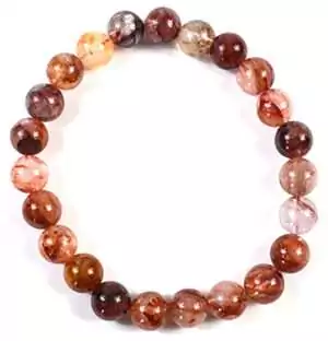 8mm Himalayan fire quartz beaded bracelet with translucent round beads in warm orange, red, and brown hues, showing natural iron inclusions and varied tone.