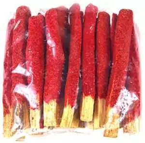 Package of red sandalwood dipped palo santo sticks bundled together for grounding and calming sacred wood smudge rituals.