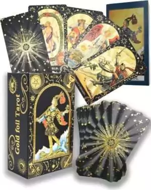 Gold Foil Rider-Waite Tarot cards displayed alongside their decorative box — luxury collector edition with gold overlay on RWS imagery.