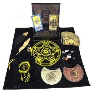 Collection of RWS gold foil tarot cards, crystals, feathers, and decorative circular pieces arranged on black cloth with a yellow pentagram design.