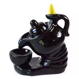 6-inch black ceramic teapot incense burner with flame-shaped top and spiral base, designed for backflow cone smoke waterfall effects during ritual use.