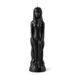Black wax candle sculpted as a standing female figure with long hair and a wick at the top, for hoodoo protection, banishing, and strength rituals.