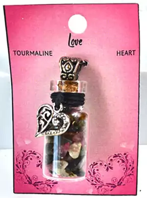 Tourmaline chips bottle necklace with heart charm showing small glass bottle pendant filled with black tourmaline crystal chips on a chain