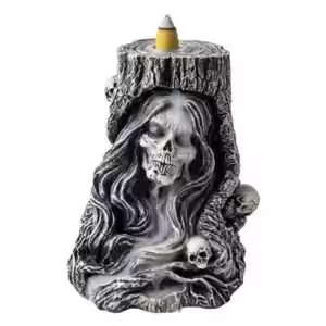 Reaper backflow incense burner 6 inches showing cascading smoke waterfall effect from backflow cone — gothic skull design for samhain and ancestor ritual work.