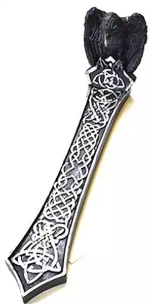 10-inch cold-cast resin raven incense holder with Celtic knotwork carved base, detailed raven sculpture perched on the stick incense burner for altar use.