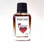 Small 1oz glass perfume bottle labeled Love with a heart design, pink-toned liquid, Espiritu brand love attraction fragrance.