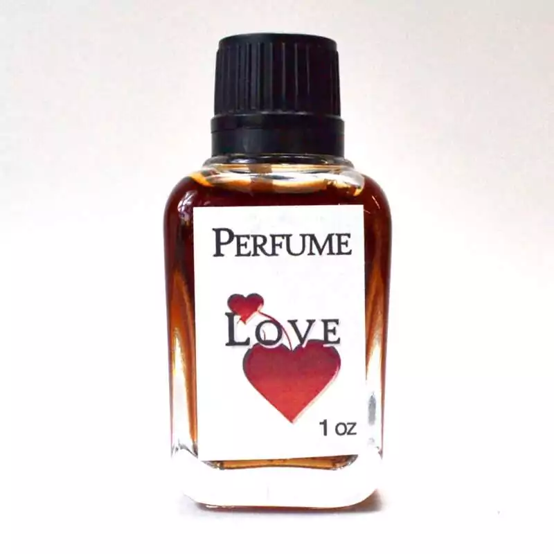 1oz-Love-perfume-OPCLOV Small 1oz glass perfume bottle labeled Love with a heart design, pink-toned liquid, Espiritu brand love attraction fragrance.
