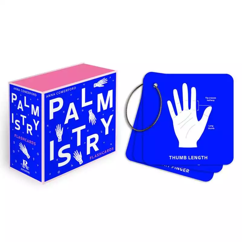 Palmistry-Flashcards-by-Anna-Comerford-DPALFLA Palmistry Flashcards by Anna Comerford showing colorful illustrated hand diagrams and reading guide cards alongside the box, 50-card palmistry learning set.