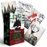 Season of the Witch Yule Oracle deck box with illustrated cards fanned out showing winter solstice and mystical imagery