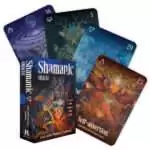 Shamanic Oracle deck cards fanned out featuring vibrant Amazonian and nature-spirit illustrations, Luis and Magali Tamani 36-card oracle deck with box.