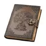 Buddha Tree of Life embossed leather journal with latch closure showing detailed leather cover with Buddhist and nature symbolism for spiritual journaling